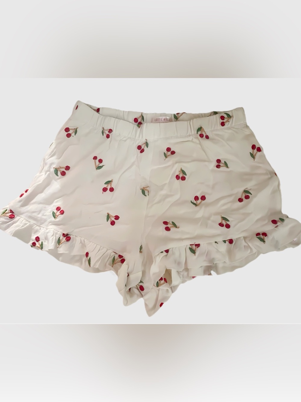 Miss Lottie- White Cherry Print Ruffle Shorts